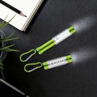 Taschenlampe für den Schlüsselbund mit leuchtendem Logo grün