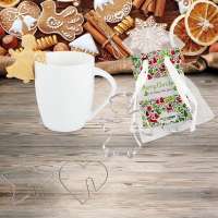 Vorschau: Tassenbackförmchen im Organzabeutel - Tassen-Stern Vorschau: Tassenbackförmchen im Organzabeutel - Tassen-Stern