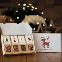 4 Weihnachts-Snacks im weißen Geschenkkarton